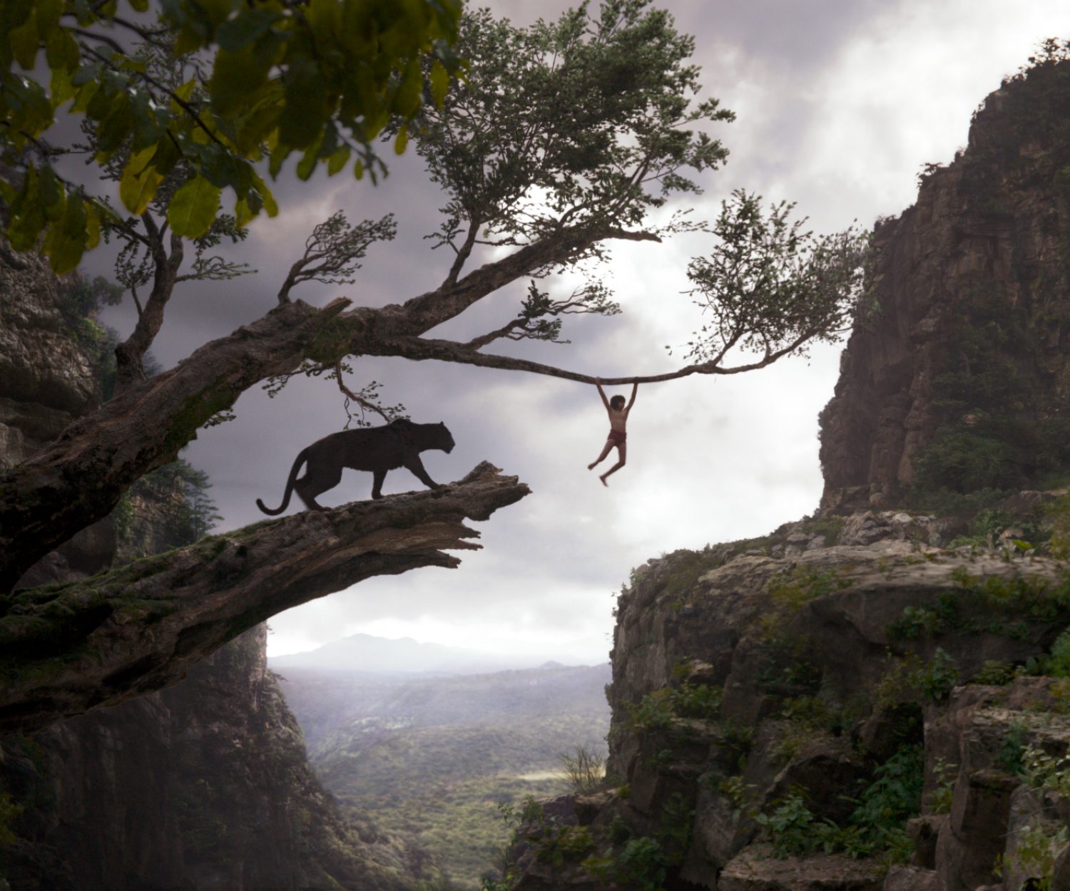 THE JUNGLE BOOK (Pictured) BAGHEERA and MOWGLI. ©2016 Disney Enterprises, Inc. All Rights Reserved.