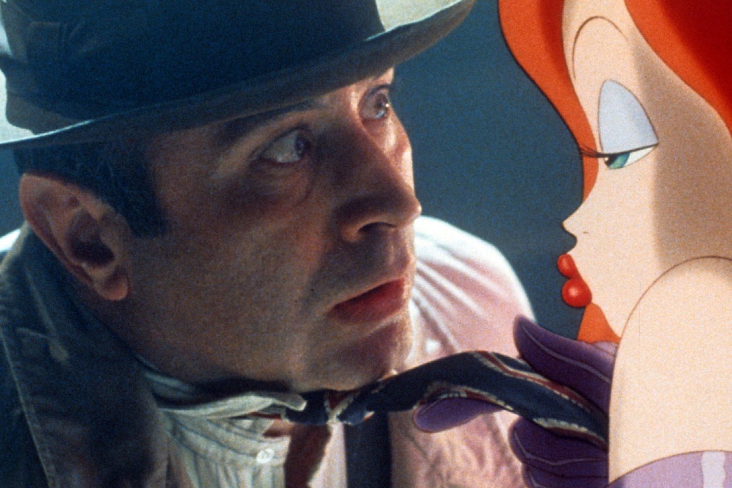 Bob Hoskins is seduced by Jessica Rabbit in a scene from the film 'Who Framed Roger Rabbit', 1988. (Photo by Buena Vista/Getty Images)