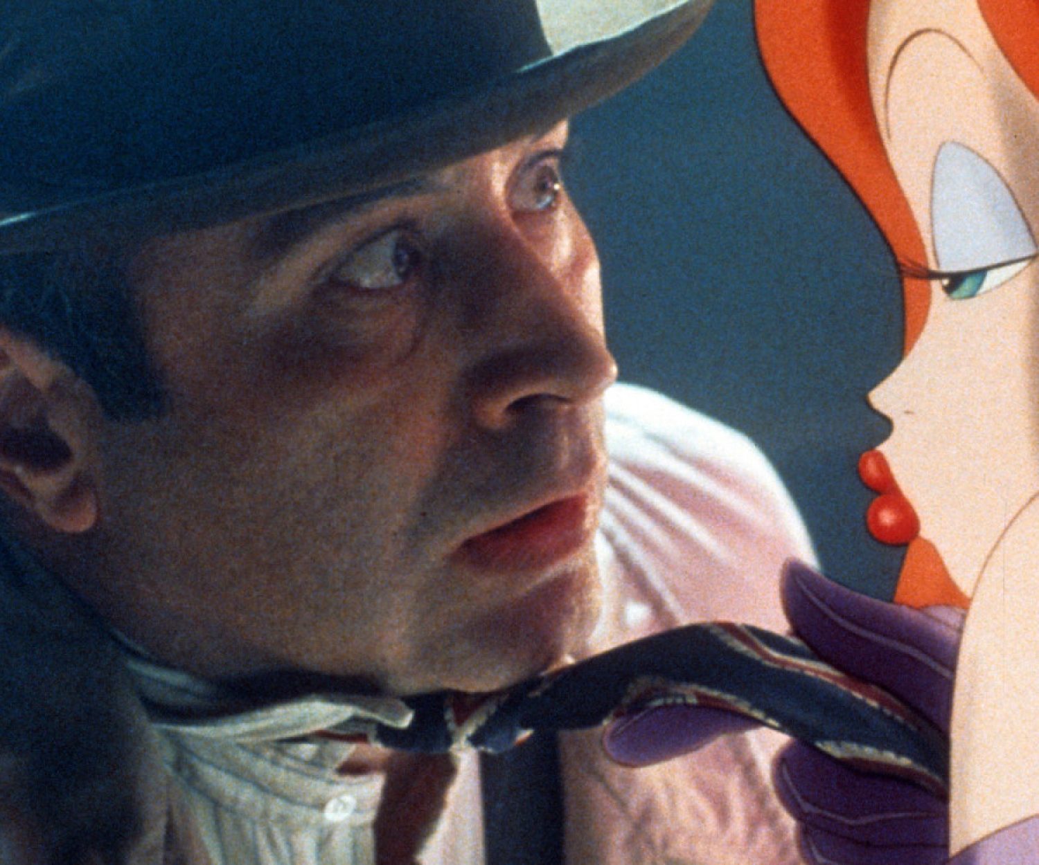 Bob Hoskins is seduced by Jessica Rabbit in a scene from the film 'Who Framed Roger Rabbit', 1988. (Photo by Buena Vista/Getty Images)