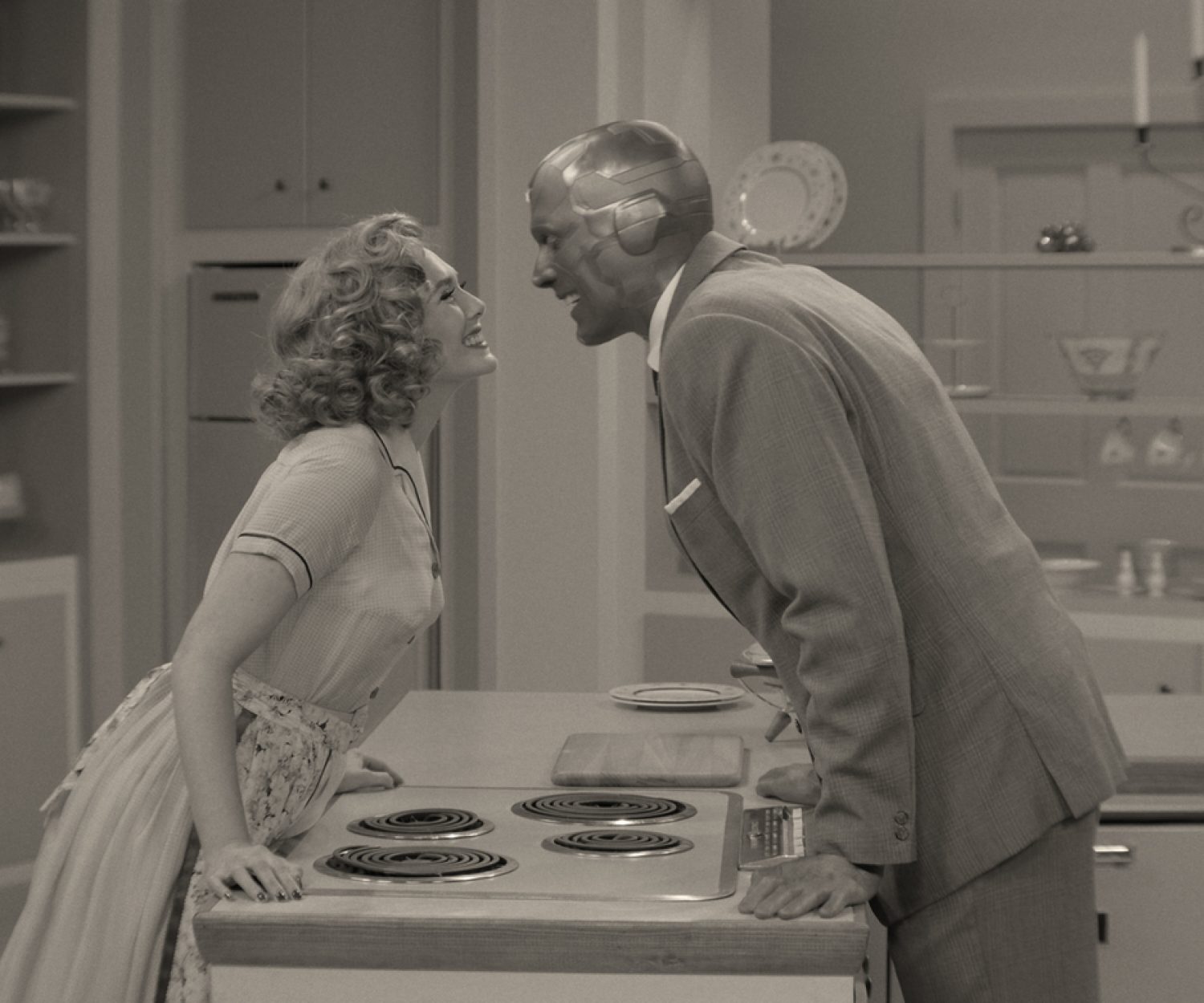 Elizabeth Olsen as Wanda Maximoff and Paul Bettany as Vision in Marvel Studios' WANDAVISION. Photo courtesy of Marvel Studios. ©Marvel Studios 2020. All Rights Reserved.