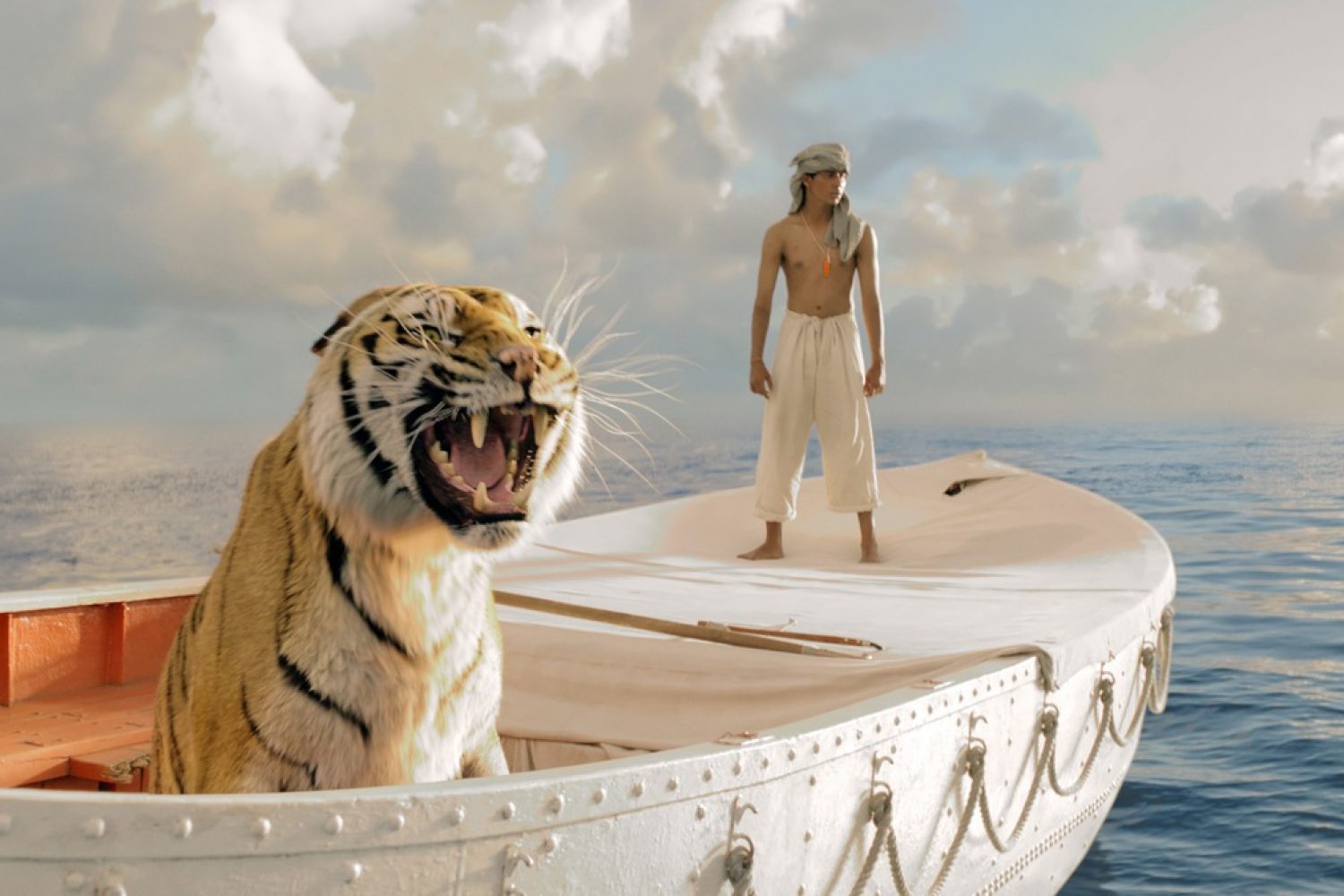 Im Bild: Der junge Pi (Suraj Sharma, r.) und ein bengalischer Tiger kämpfen monatelang unfreiwillig ums Überleben auf hoher See.Ein echtes Filmwunder: Ang Lees OSCAR(r) prämierter "Life of Pi - Schiffbruch mit Tiger" am 2. November 2014 auf ProSieben.Ang Lee ("Tiger & Dragon") hat es mit diesem bildgewaltigen Hochsee-Abenteuer erneut allen gezeigt: Vier OSCARS(r), über 600 Millionen US-Dollar Boxoffice und Kritiker, die sich mit ihren Lobeshymnen geradezu überschlugen. Und all das gelang ihm mit einer Story über einen indischen Jungen und einen bengalischen Tiger, die gemeinsam in einem Rettungsboot auf dem Ozean überleben müssen - gänzlich ohne bekannte Stars, dafür aber mit poetischen Bildern, leise-optimistischem Humor und großen philosophischen Fragen an unsere Existenz. Ein echtes Filmwunder ... ProSieben zeigt "Life of Pi - Schiffbruch mit Tiger" am Sonntag, 2. November 2014, um 20:15 Uhr zum ersten Mal im Free-TV.© 2012 Twentieth Century Fox Film Corporation. All rights reserved.Dieses Bild darf bis 04.11.2014 honorarfrei fuer redaktionelle Zwecke und nur im Rahmen der Programmankuendigung verwendet werden. Spaetere Veroeffentlichungen sind nur nach Ruecksprache und ausdruecklicher Genehmigung der ProSiebenSat1 TV Deutschland GmbH moeglich. Verwendung nur mit vollstaendigem Copyrightvermerk. Das Foto darf nicht veraendert, bearbeitet und nur im Ganzen verwendet werden. Nicht für EPG! Es darf nicht archiviert werden. Es darf nicht an Dritte weitergeleitet werden. Bei Fragen: 089/9507-1589.Voraussetzung fuer die Verwendung dieser Programmdaten ist die Zustimmung zu den Allgemeinen Geschaeftsbedingungen der Presselounges der Sender der ProSiebenSat.1 Media AG. Weiterer Text über OTS und www.presseportal.de/pm/25171 / Die Verwendung dieses Bildes ist für redaktionelle Zwecke honorarfrei. Veröffentlichung bitte unter Quellenangabe: "obs/ProSieben Television GmbH/Photo : Rhythm & Hues"