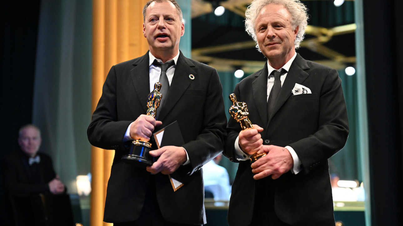 Charlie Mackesy and Matthew Freud pose backstage with the Oscar® for Animated Short Film during the live ABC telecast of the 95th Oscars® at Dolby® Theatre at Ovation Hollywood on Sunday, March 12, 2023.