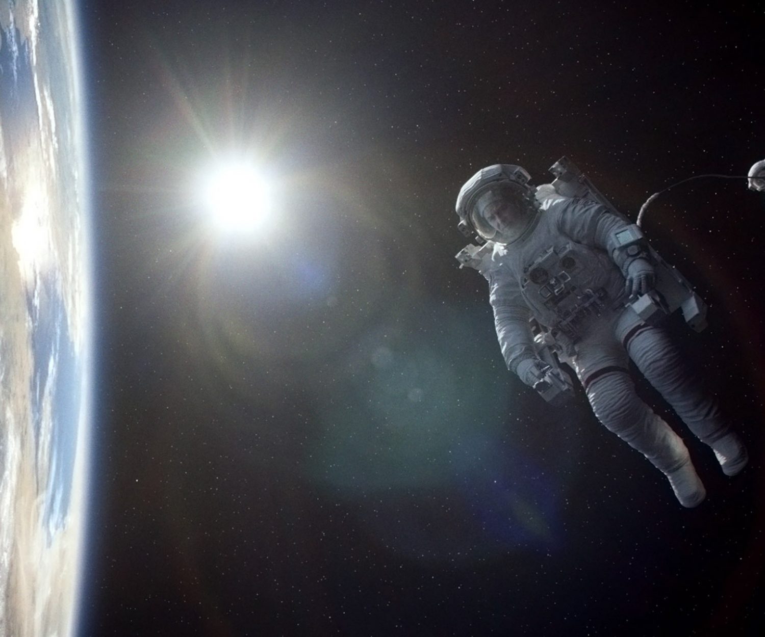 George Clooney and Sandra Bullock play astronauts marooned in space in <em>Gravity,</em> a visual marvel of a movie from director Alfonso Cuaron<em>. </em>